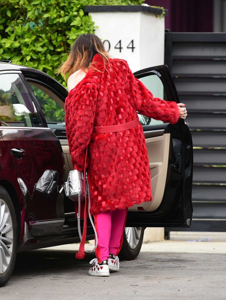 Bella Thorne in a Red Fur Coat