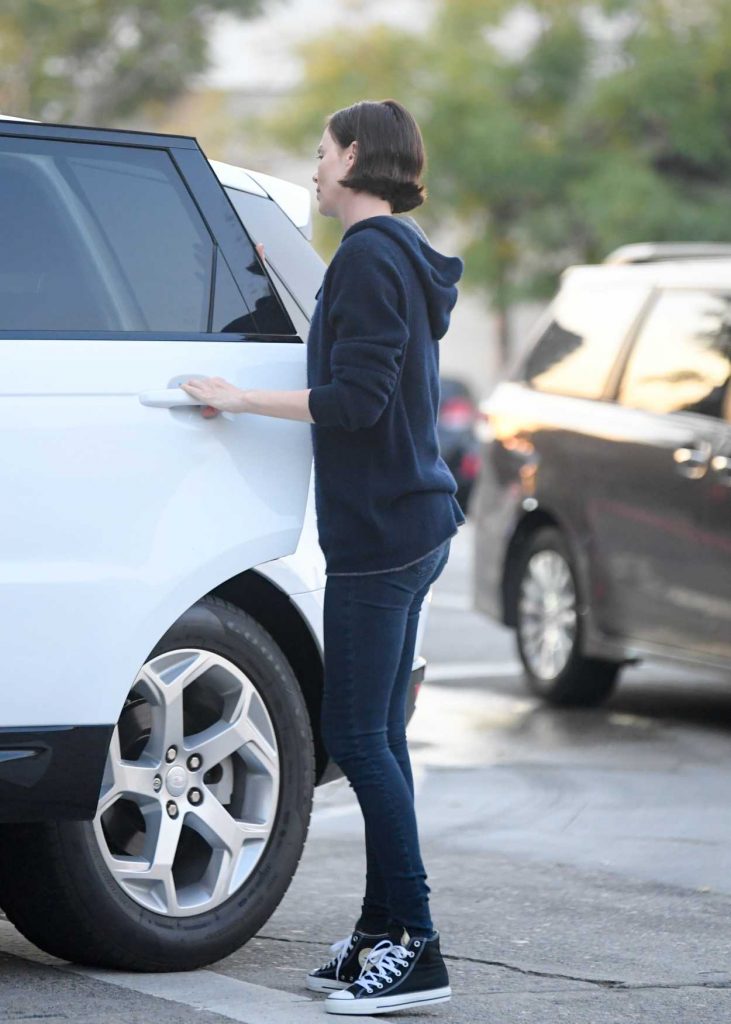 Charlize Theron in a Converse Gym Shoes