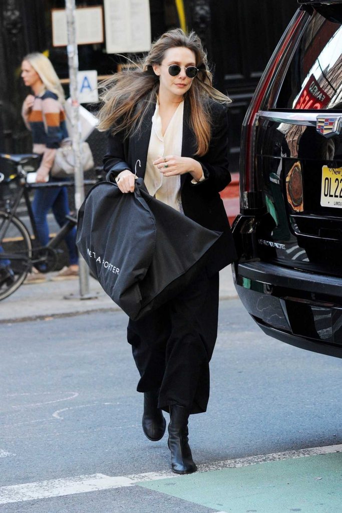 Elizabeth Olsen in a Black Suit