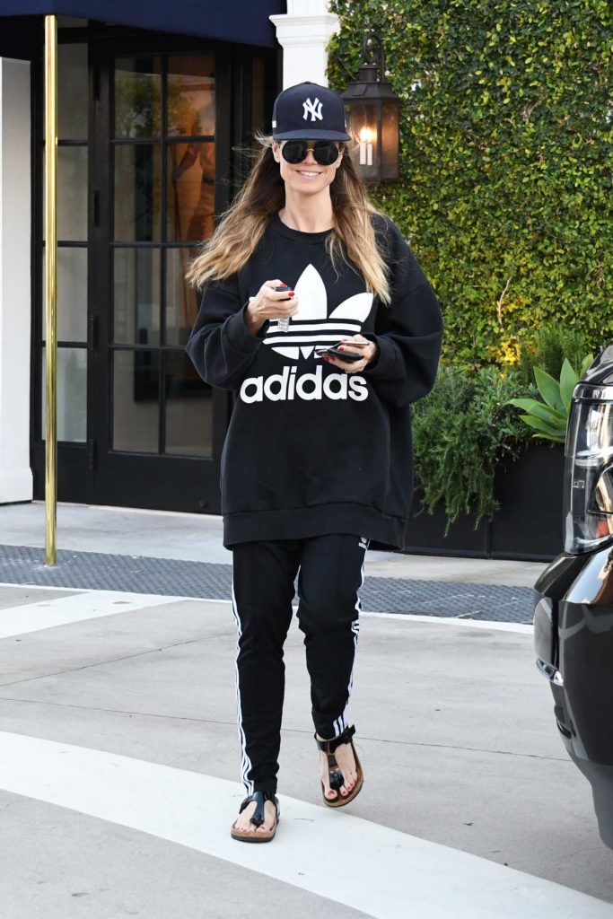 Heidi Klum in a Black Adidas Sweatshirt