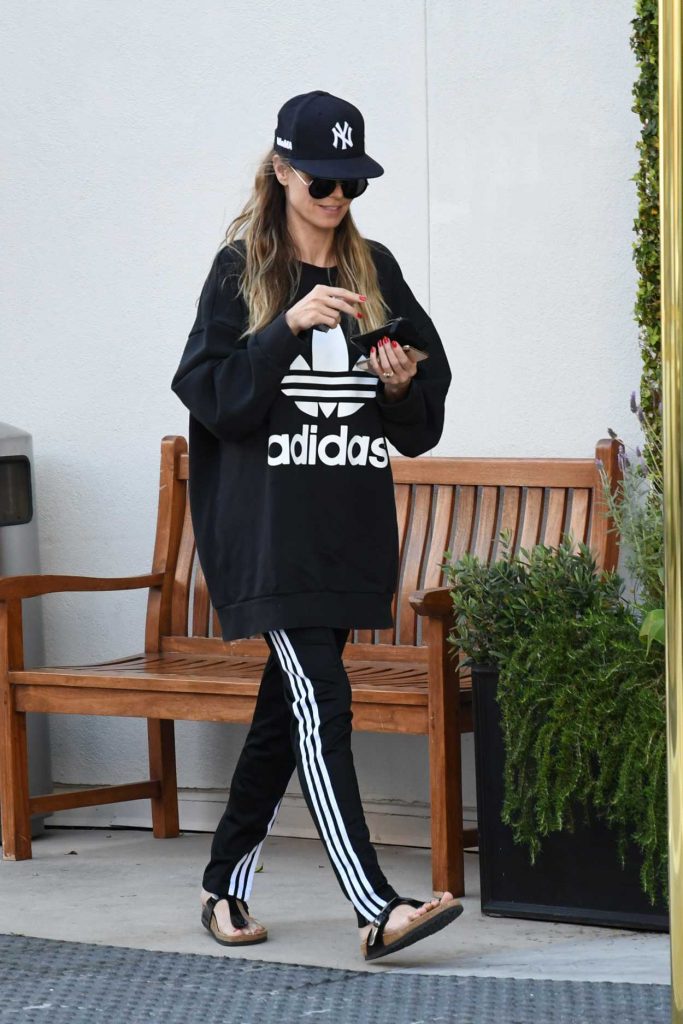 Heidi Klum in a Black Adidas Sweatshirt