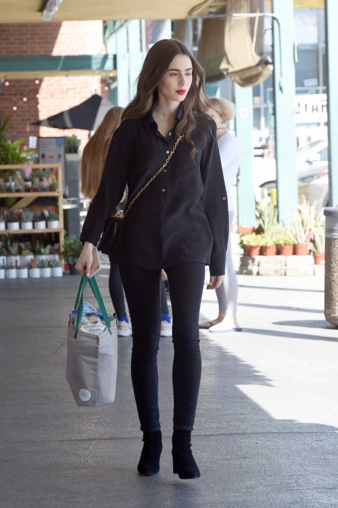Lily Collins in a Black Shirt