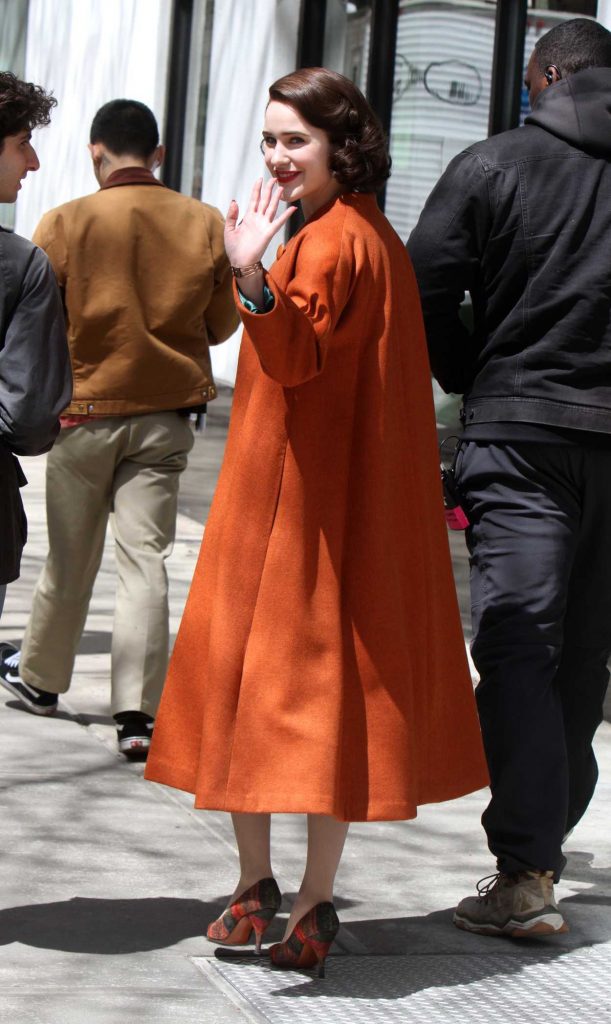 Rachel Brosnahan in an Orange Coat