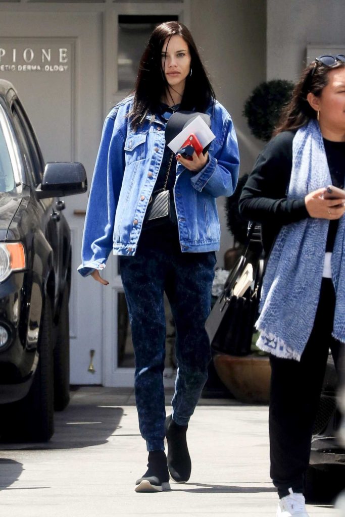 Adriana Lima in a Blue Denim Jacket