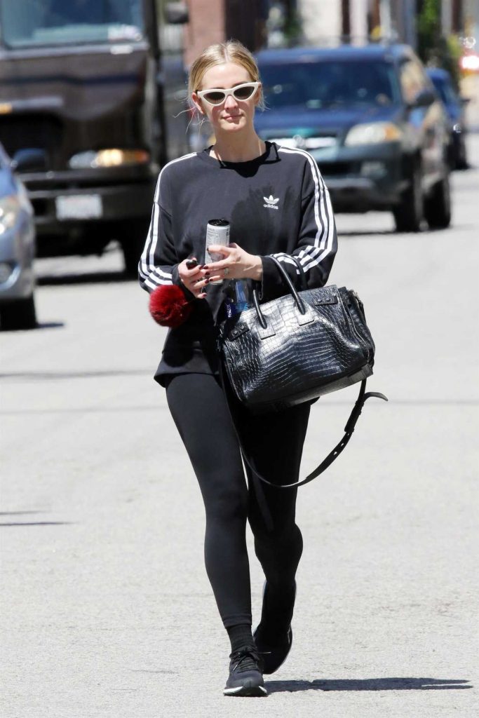 Ashlee Simpson in a Black Adidas Sweatshirt