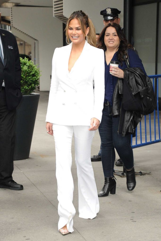Chrissy Teigen in a White Suit