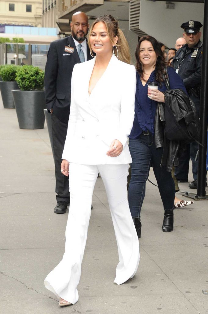 Chrissy Teigen in a White Suit