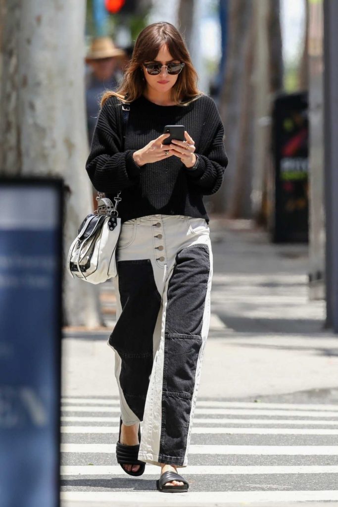 Dakota Johnson in a Black Sweater