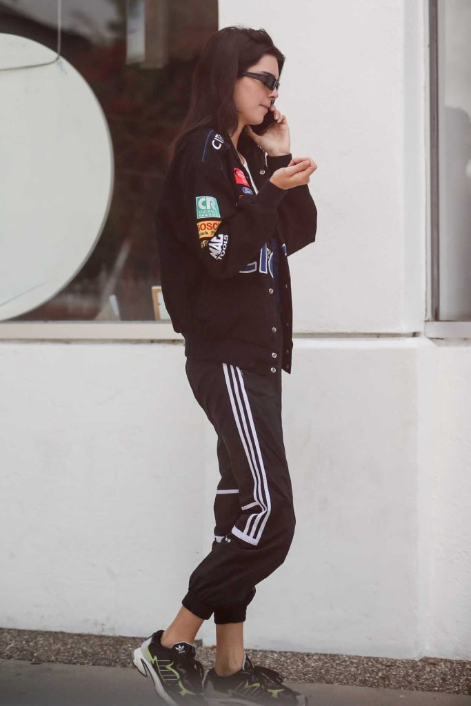 Kendall Jenner in a Black Adidas Track Pants