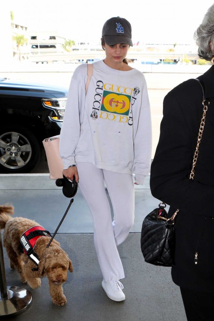 Taylor Hill in a White Gucci Sweatshirt