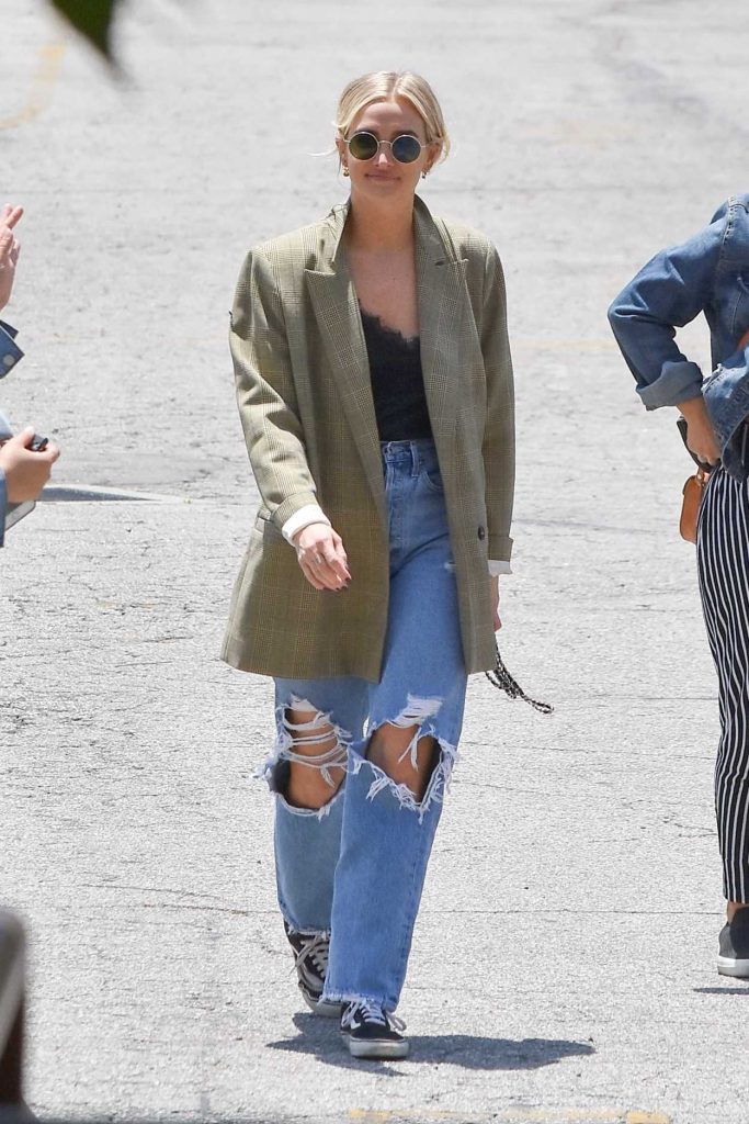 Ashlee Simpson in a Blue Ripped Jeans