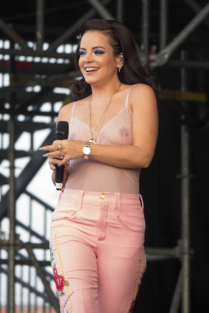 Lily Allen in a Pink Transparent Blouse