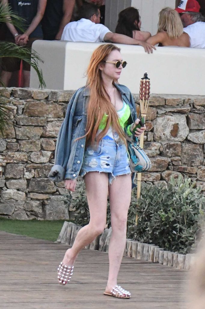 Lindsay Lohan in a Denim Ripped Shorts