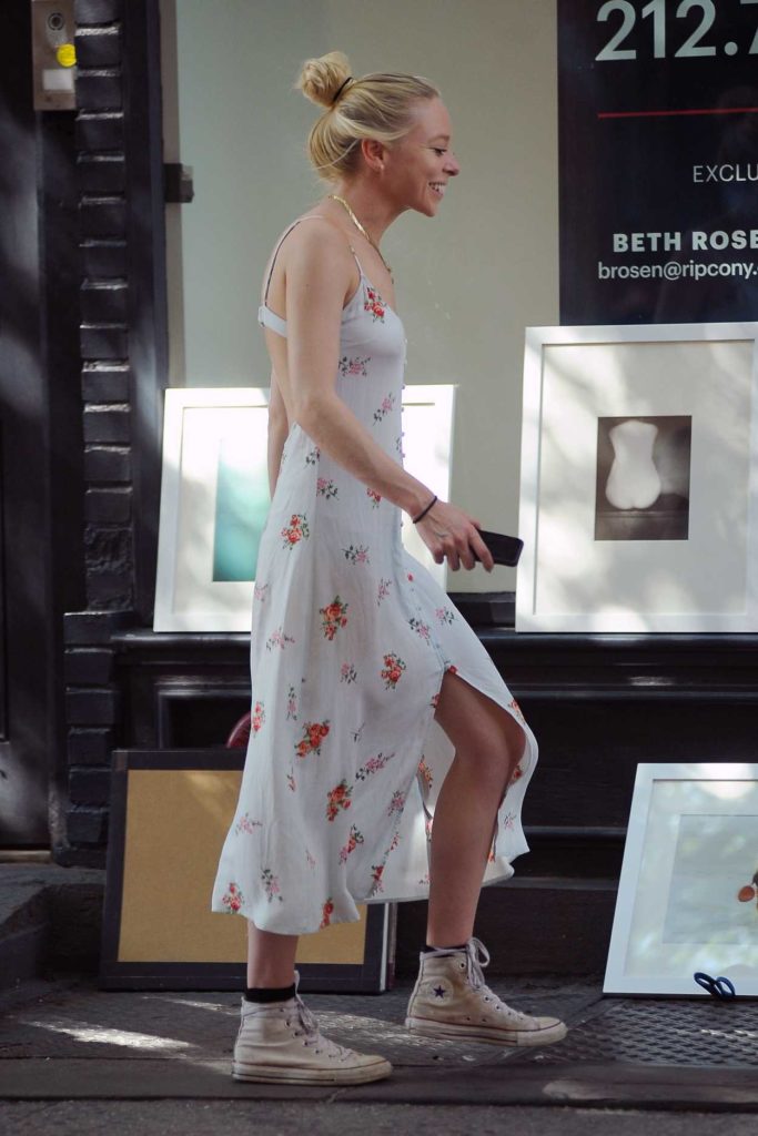 Portia Doubleday in a White Floral Sundress