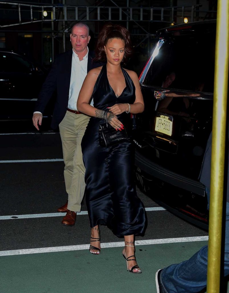 Rihanna in a Silky Black Dress
