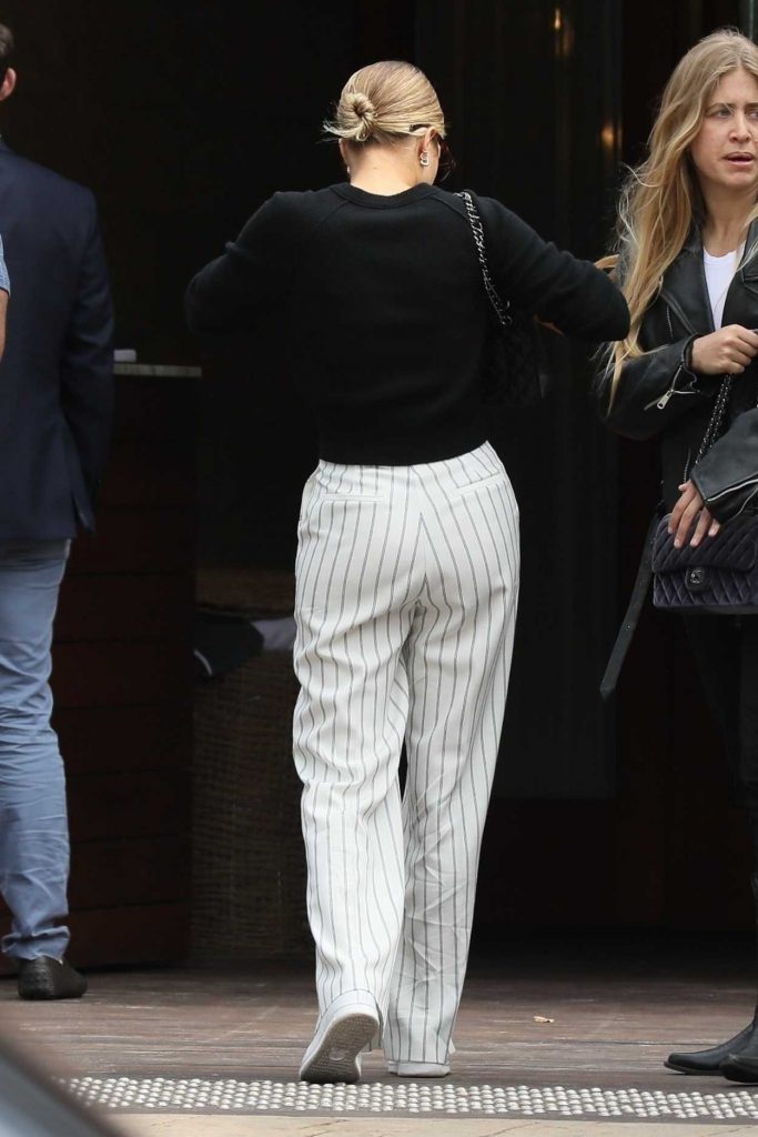 Sofia Richie in a White Striped Pants