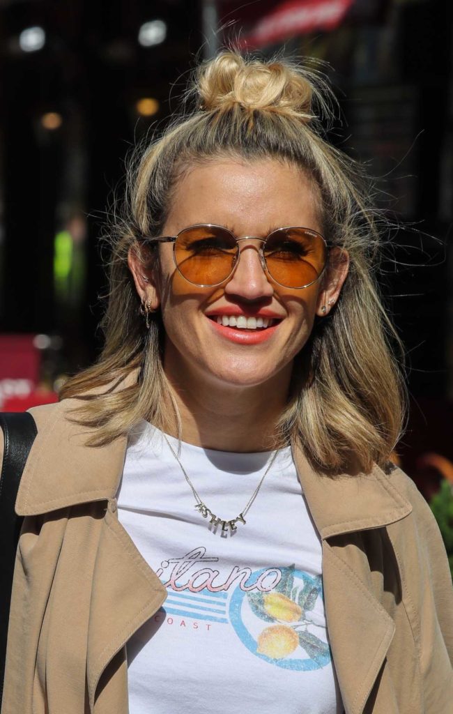 Ashley Roberts in a Beige Trench Coat