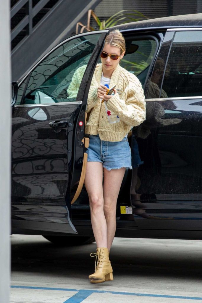 Emma Roberts in a Blue Daisy Duke Shorts