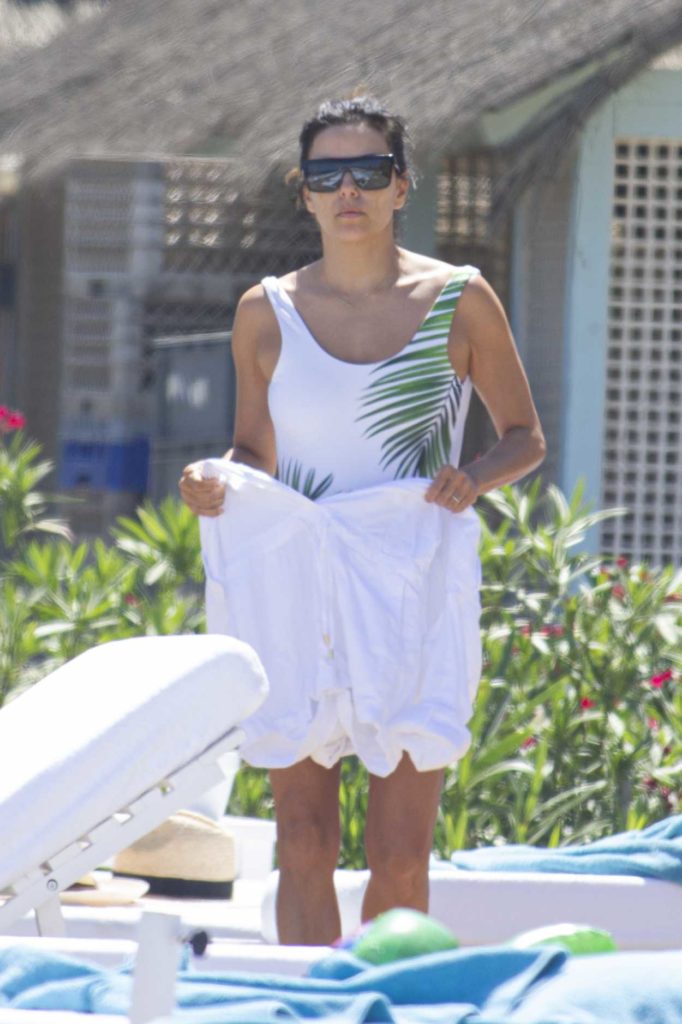 Eva Longoria in a White Swimsuit