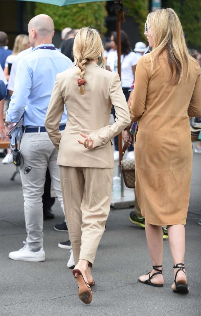 Sienna Miller in a Beige Suit