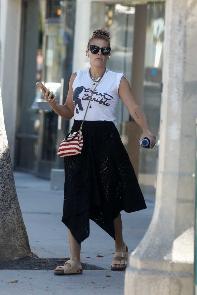 Busy Philipps in a Black Skirt