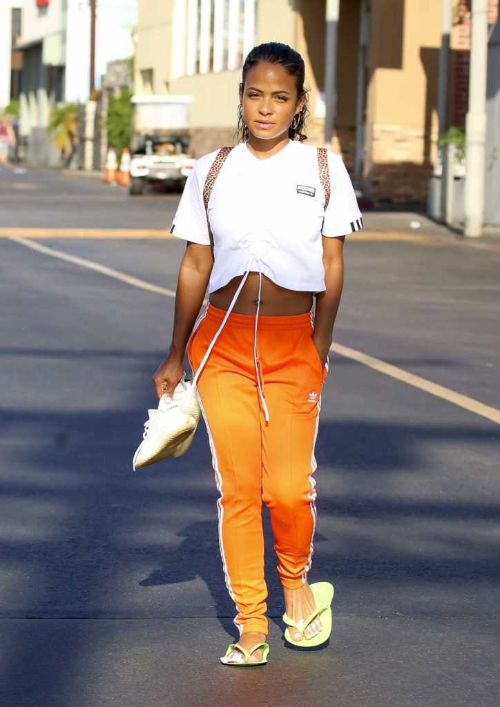Christina Milian in an Orange Adidas Track Pants