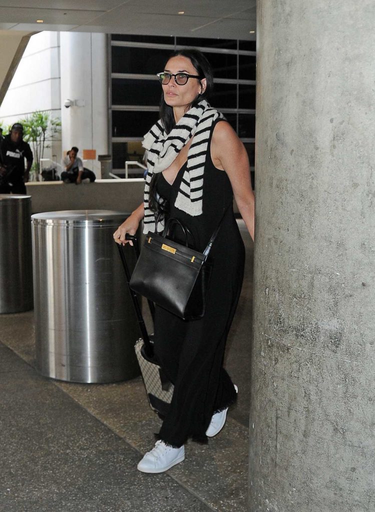 Demi Moore in a White Sneakers