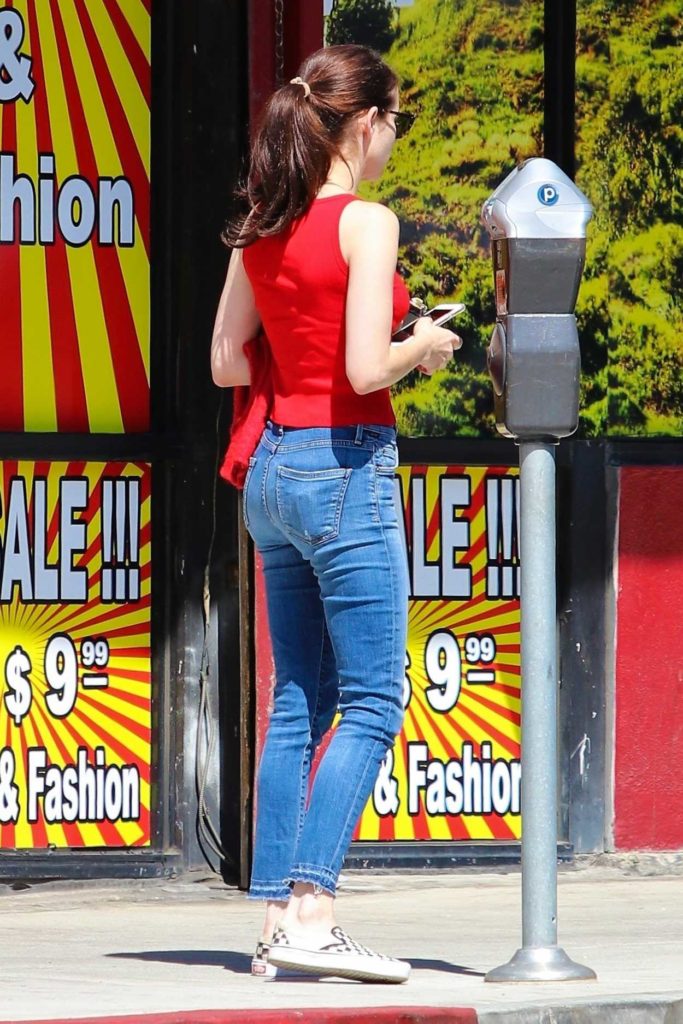 Emma Roberts in a Red Tank Top