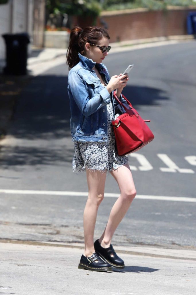 Emma Roberts in a Short Gray Floral Dress