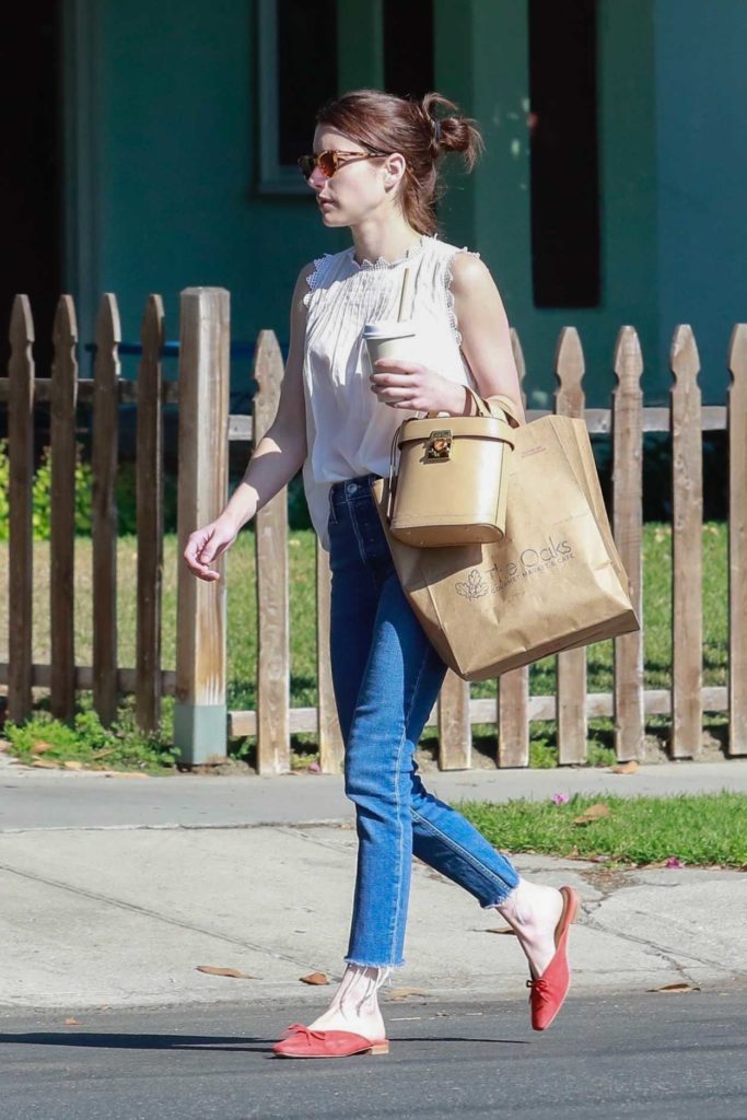 Emma Roberts in a White Blouse