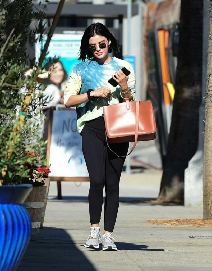 Lucy Hale in a Gray Sneakers