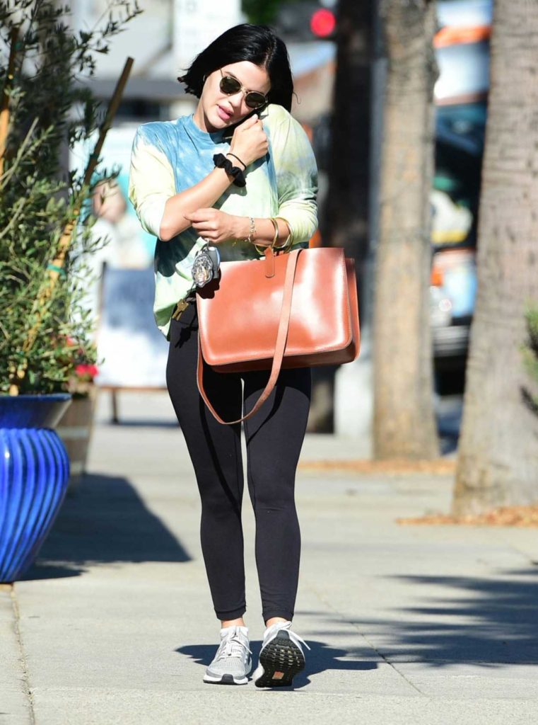 Lucy Hale in a Gray Sneakers