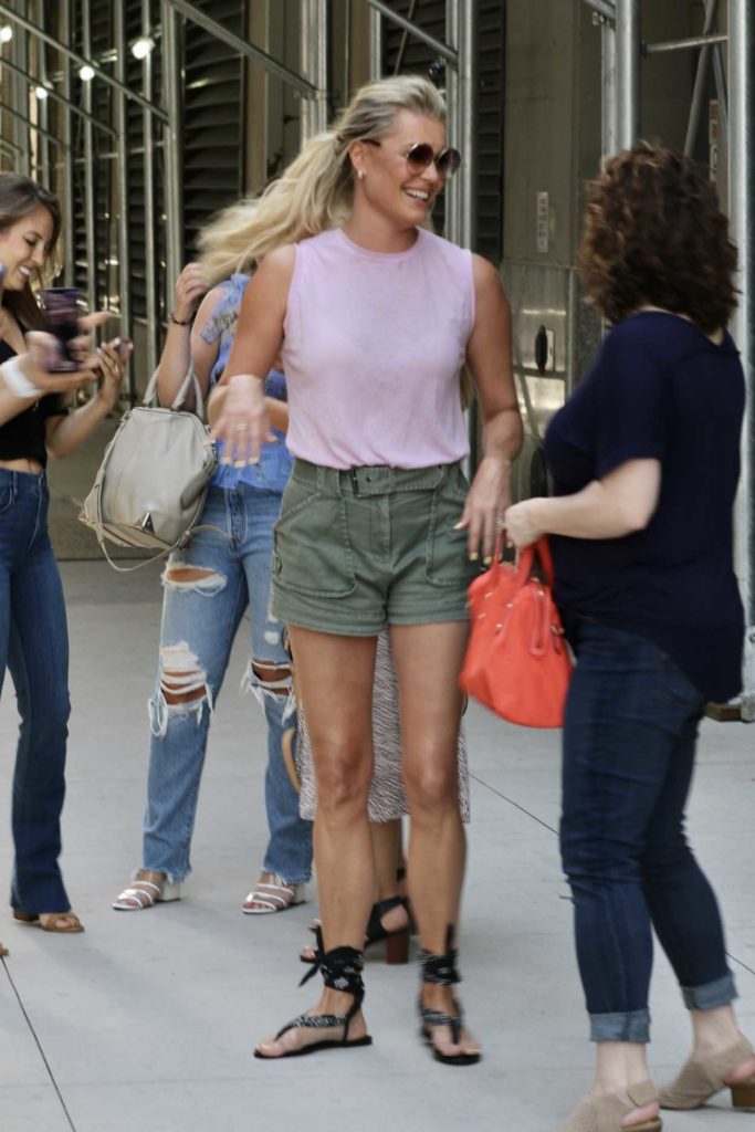Rebecca Romijn in a Green Shorts