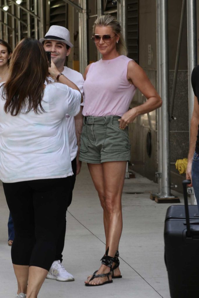 Rebecca Romijn in a Green Shorts