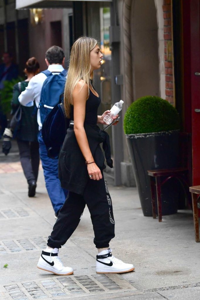 Sistine Stallone in a White Sneakers