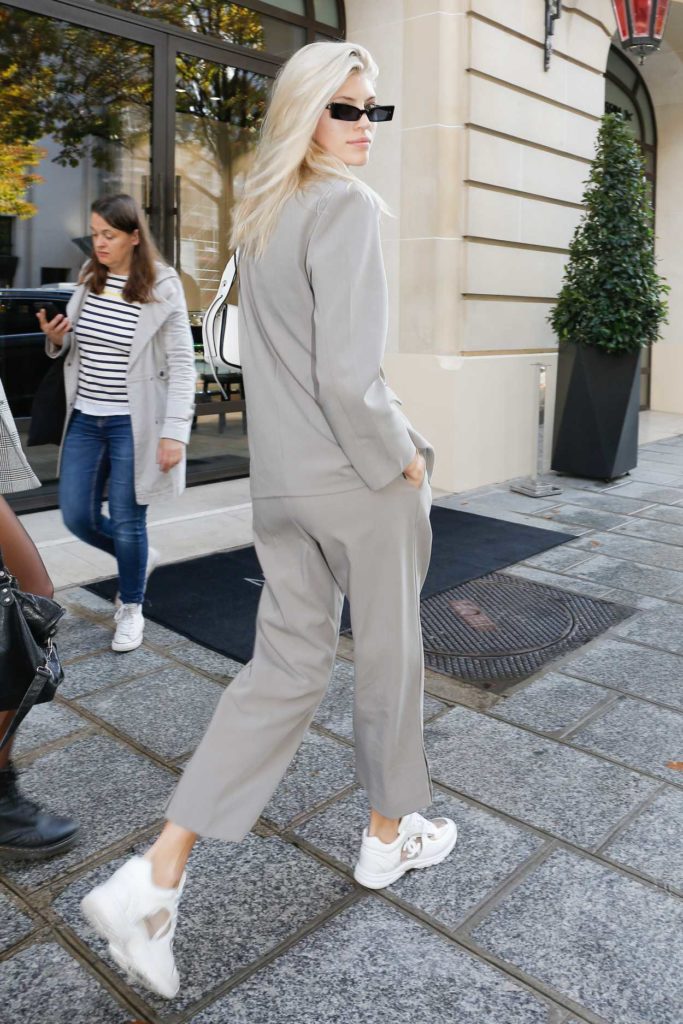 Devon Windsor in a Gray Suit