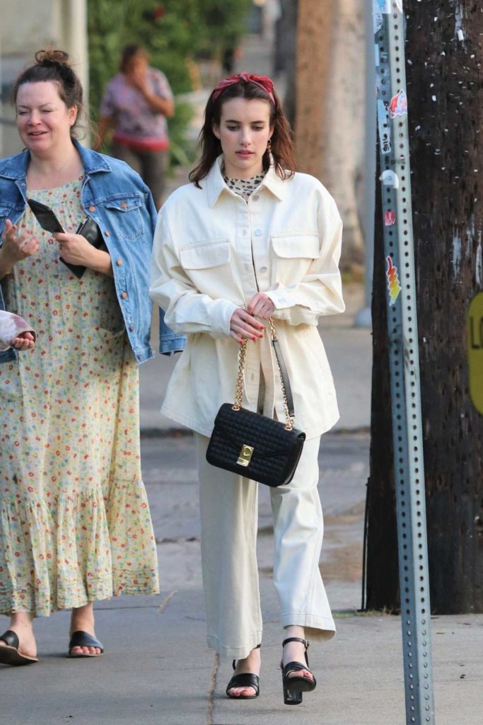 Emma Roberts in a White Suit