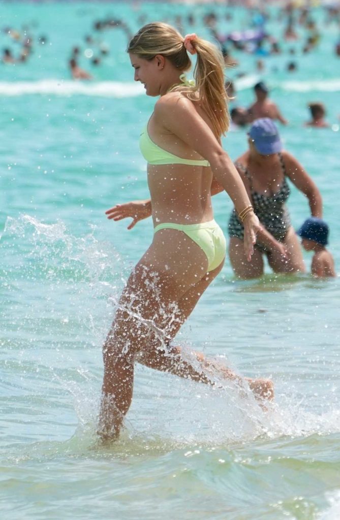 Eugenie Bouchard in a Neon Green Bikini