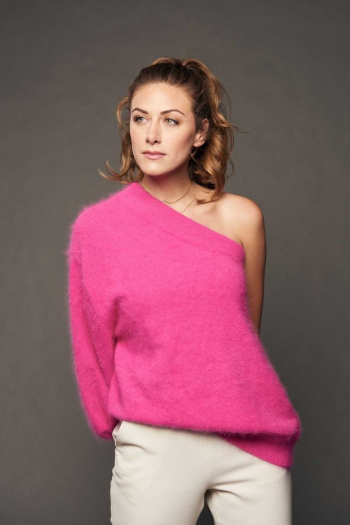 Perry Mattfeld in a Pink Sweater