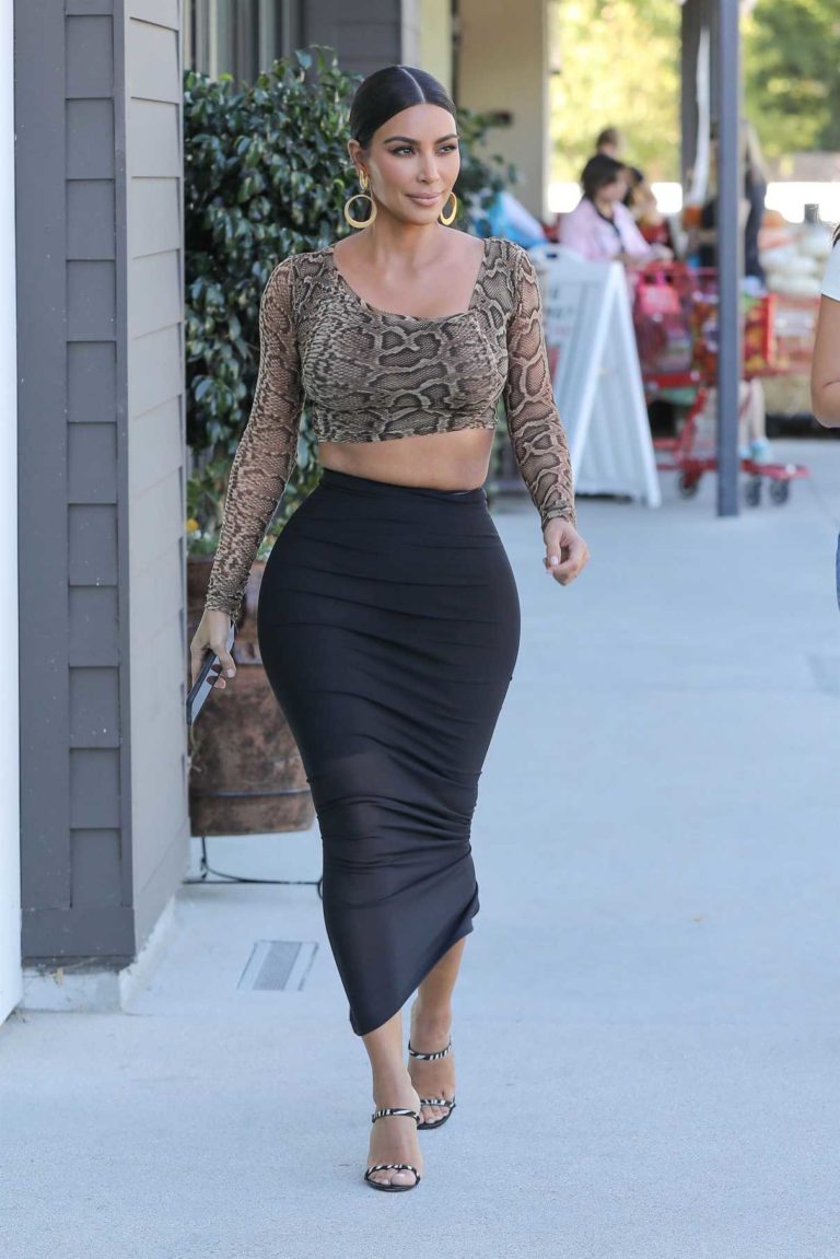 Kim Kardashian in a Snakeskin Blouse Stops by Ulta Beauty Cosmetics