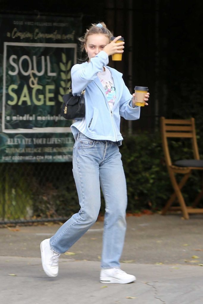 Lily-Rose Depp in a White Sneakers