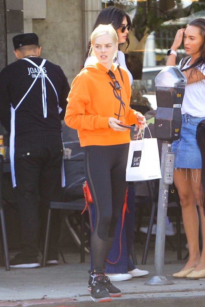 Samara Weaving in an Orange Hoody