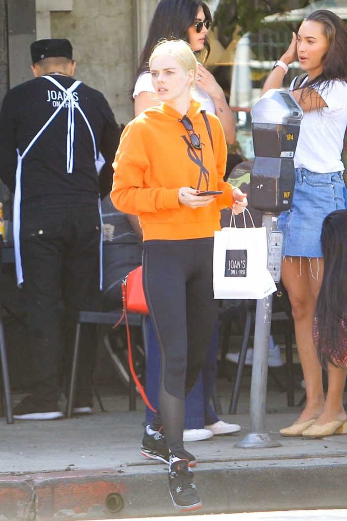 Samara Weaving in an Orange Hoody