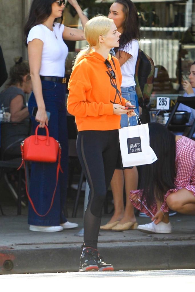 Samara Weaving in an Orange Hoody