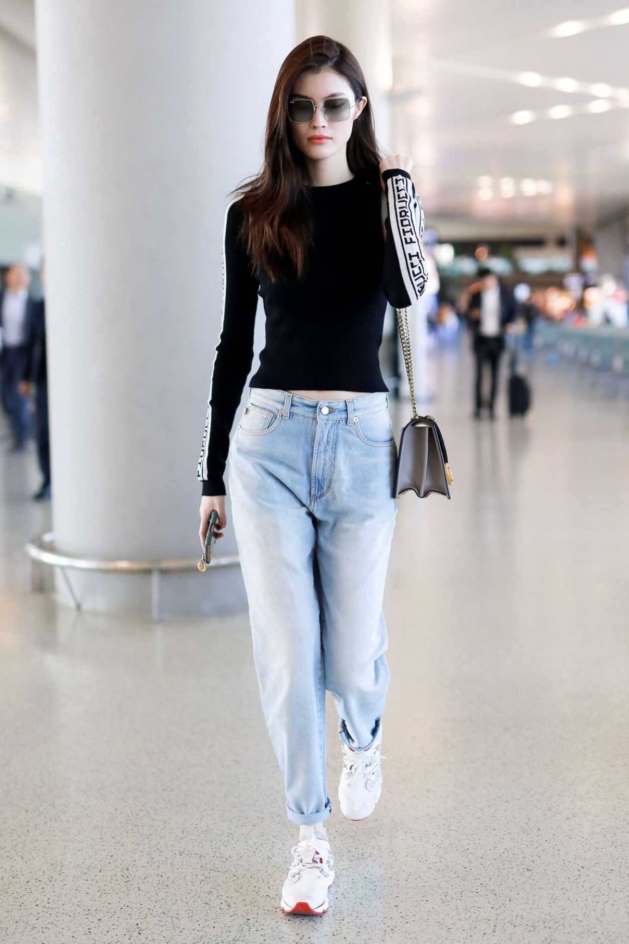 Sui He in a Blue Jeans Arrives at Shanghai Hongqiao Airport in Shanghai ...