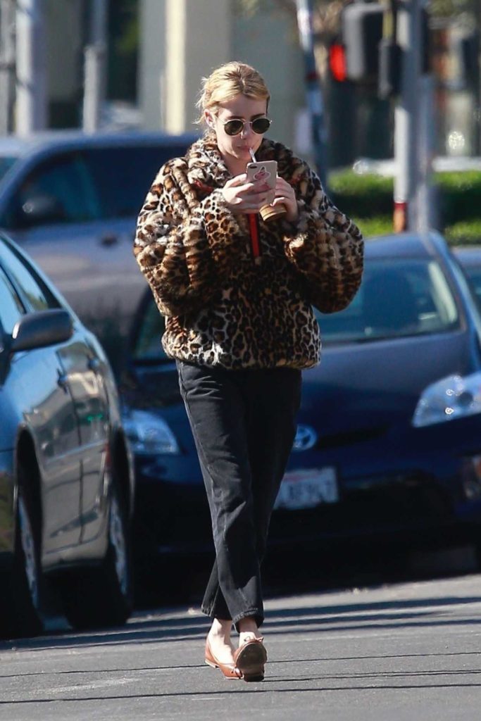 Emma Roberts in a Leopard Print Fur Jacket