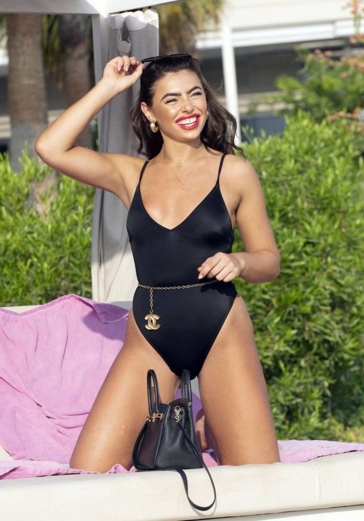 Francesca Allen in a Black Swimsuit
