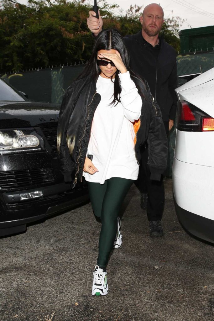 Kourtney Kardashian in a Black Bomber Jacket