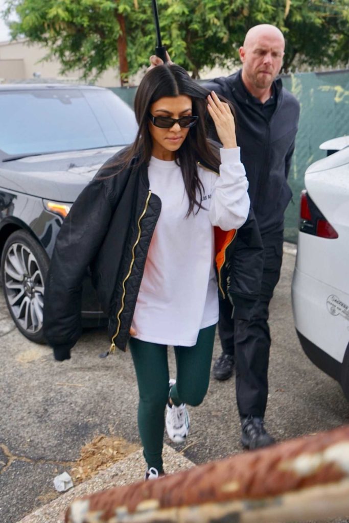 Kourtney Kardashian in a Black Bomber Jacket