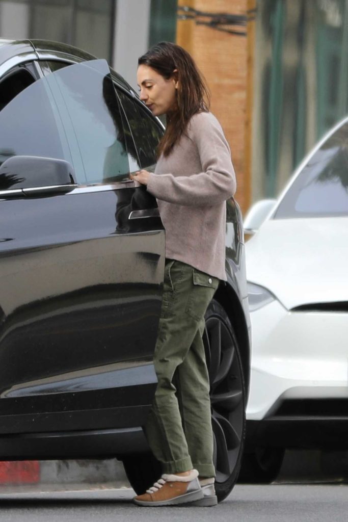 Mila Kunis in a Green Pants